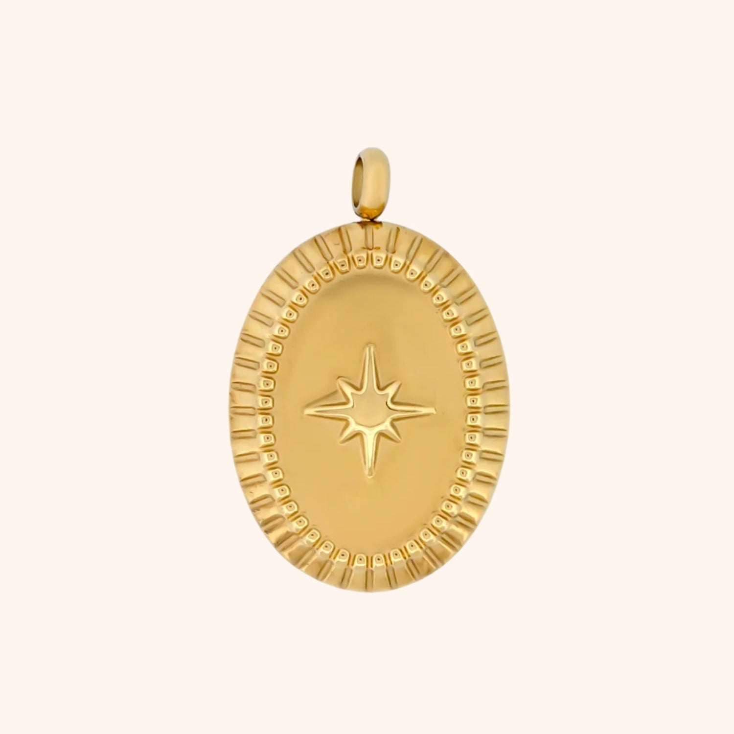 Close-up of the Horizon Charm, an oval-shaped gold charm with a textured surface and a North Star detail.